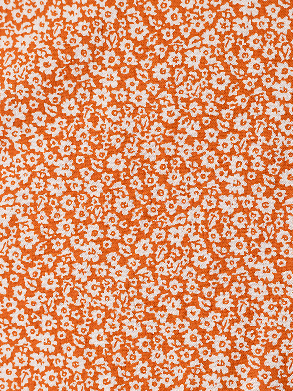 ISMA - Oransje kjole med blomster fra Kaffe Curve